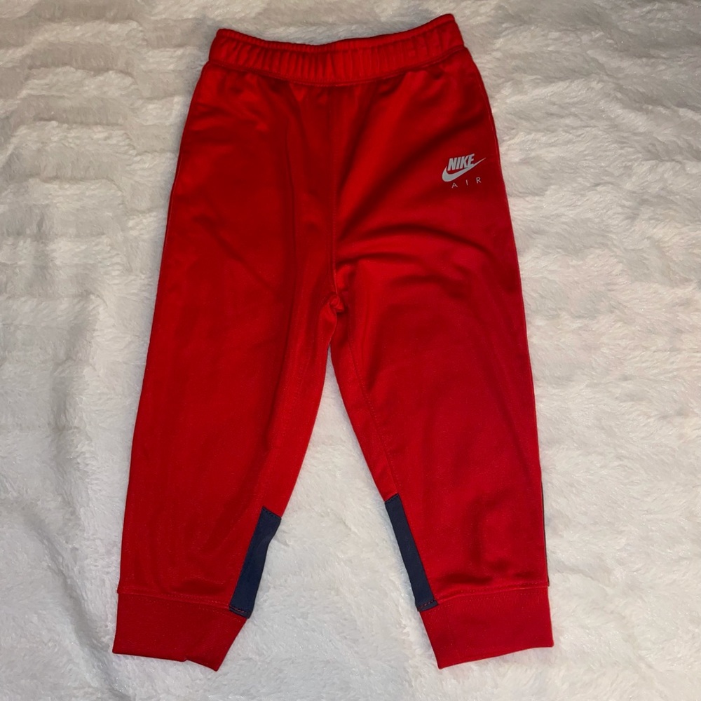 Nike red joggers for 24M